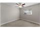 Bedroom with ceiling fan and window with blinds at 3336 Florene Dr, Orlando, FL 32806