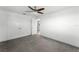 Bedroom with ceiling fan, carpet, and double doors at 3336 Florene Dr, Orlando, FL 32806