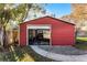 Storage shed interior with ATV and various storage items at 3336 Florene Dr, Orlando, FL 32806