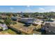 Aerial view showcasing the home's backyard and screened porch at 3437 Starfish Ave, Fruitland Park, FL 34731