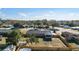 Aerial view of a home with backyard, screened porch, and fence at 3437 Starfish Ave, Fruitland Park, FL 34731