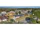 Aerial view of a ranch home in a residential area at 3437 Starfish Ave, Fruitland Park, FL 34731