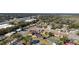 Wide aerial view of neighborhood with the house in the center at 3437 Starfish Ave, Fruitland Park, FL 34731