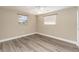 Spacious bedroom with ceiling fan and vinyl flooring at 3437 Starfish Ave, Fruitland Park, FL 34731