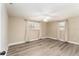 Spacious bedroom with two windows and vinyl flooring at 3437 Starfish Ave, Fruitland Park, FL 34731