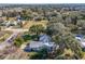 Aerial view of a single Gathering home with large backyard at 36703 Sandy Ln, Grand Island, FL 32735