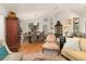 Bright dining room with a wood table, chairs, and an antique cabinet at 36703 Sandy Ln, Grand Island, FL 32735