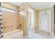 Updated bathroom with a tub, shower, and toilet at 3795 View Path, The Villages, FL 32163