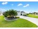 House exterior with driveway and landscaping at 3795 View Path, The Villages, FL 32163