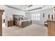 Spacious main bedroom with large bed, ample natural light, and plush carpeting at 3795 View Path, The Villages, FL 32163