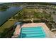 Community pool with lap lanes and a lake view at 3951 Kennebunk Loop, Mount Dora, FL 32757