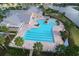 Resort-style pool with lap lanes and a spa at 3951 Kennebunk Loop, Mount Dora, FL 32757