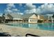 Resort-style pool with clubhouse and patio area at 3951 Kennebunk Loop, Mount Dora, FL 32757