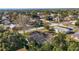 Aerial view showcasing home and pool in neighborhood at 401 Cherry Tree St, Eustis, FL 32726