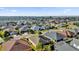 Aerial view of houses in a residential neighborhood at 4063 Deskin Ln, The Villages, FL 32163