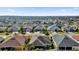 Aerial view of houses in a residential neighborhood at 4063 Deskin Ln, The Villages, FL 32163