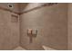 Walk-in shower with tiled walls and seat at 4063 Deskin Ln, The Villages, FL 32163