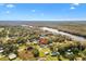 Aerial view showing home location in a residential neighborhood by the river at 4777 Cr 306A, Lake Panasoffkee, FL 33538