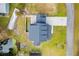 Bird's-eye view of home, yard, and nearby waterway at 4777 Cr 306A, Lake Panasoffkee, FL 33538