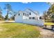 Side view of the house showing modern design and landscaping at 4777 Cr 306A, Lake Panasoffkee, FL 33538