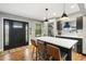 Modern kitchen with dark cabinetry and white quartz countertops at 4777 Cr 306A, Lake Panasoffkee, FL 33538