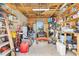 Well-equipped workshop with ample storage shelving and tools at 4777 Cr 306A, Lake Panasoffkee, FL 33538