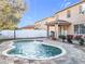 Relaxing kidney-shaped pool with fountain in the backyard at 5036 Gandross Ln, Mount Dora, FL 32757