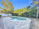 Enjoy this kidney-shaped pool with fountain and large backyard at 5036 Gandross Ln, Mount Dora, FL 32757