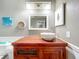 Bathroom with wood vanity and vessel sink at 5036 Gandross Ln, Mount Dora, FL 32757