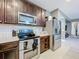 Kitchen with stainless steel appliances and ample counter space at 5036 Gandross Ln, Mount Dora, FL 32757