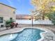 Relaxing kidney-shaped pool with fountain in backyard at 5036 Gandross Ln, Mount Dora, FL 32757