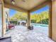 Relaxing pool area with patio furniture and lush landscaping at 5036 Gandross Ln, Mount Dora, FL 32757