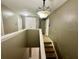 Upstairs hallway with access to bedrooms and stairs at 5036 Gandross Ln, Mount Dora, FL 32757