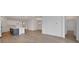 Wide-open living area with views of the kitchen, dining area and hallway at 5095 Firebush Dr, Apopka, FL 32712