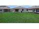 Expansive backyard with lush green grass, offering ample space for outdoor activities at 5131 Firebush Dr, Apopka, FL 32712