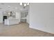 Open living space with recessed lighting and hardwood floors near the kitchen at 5131 Firebush Dr, Apopka, FL 32712