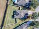 Aerial view of a house with a large backyard at 5929 Coquyt Dr, Mount Dora, FL 32757