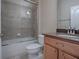 Clean bathroom with tub, shower, and granite vanity at 5929 Coquyt, Mount Dora, FL 32757