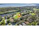 Property's location shown in an aerial view, near a lake at 6220 Topsail Rd, Lady Lake, FL 32159