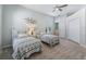 Two twin beds in a well-lit bedroom with ample closet space at 6220 Topsail Rd, Lady Lake, FL 32159