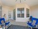 Bright screened porch with window and access to backyard at 6220 Topsail Rd, Lady Lake, FL 32159