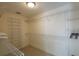 Spacious walk-in closet with ample shelving and hanging space at 670 Murphys Estate Dr, The Villages, FL 32162