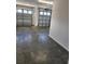 Two-car garage with ample space and polished concrete floor at 6851 Wendy Way, The Villages, FL 32163