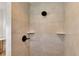 Walk-in shower with beige tile and double shower heads at 6851 Wendy Way, The Villages, FL 34762