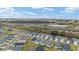 Aerial view of community near highway at 7189 Denver Ave, The Villages, FL 34762