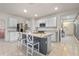 Bright kitchen featuring an island and white cabinets at 808 Brooklet Dr, Davenport, FL 33837