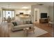 Bright, airy living room with open concept kitchen and breakfast nook at 9565 Se 124Th Loop, Summerfield, FL 34491