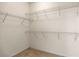 Large walk-in closet with wire shelving at 9565 Se 124Th Loop, Summerfield, FL 34491