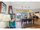 Charming dining room with water views and modern light fixtures at 9724 Rosemary Ln, Leesburg, FL 34788