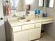 Neutral bathroom featuring a single sink vanity with ample counter space and storage at 10173 Se 175Th Ln, Summerfield, FL 34491